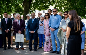 Floral tributes at the Memorial to the Kolhapur family in Warsaw